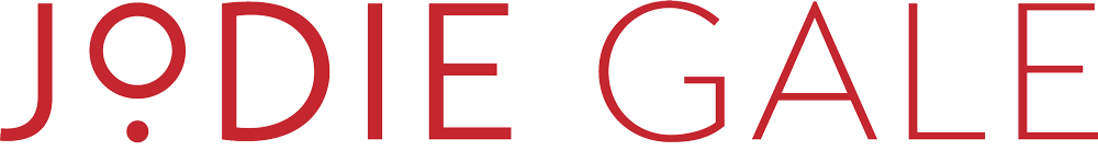 Red text on a light background spells "JODIE GALE" in a modern, sans-serif font, featuring a unique dot inside the "O"—a sleek look for an allied health business coach Sydney professional.