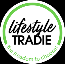 Circular logo with the words "lifestyle TRADIE" in the center, a green arc above, and "the freedom to choose!" curved along the bottom—perfect for a tradie business coach seeking a professional brand.