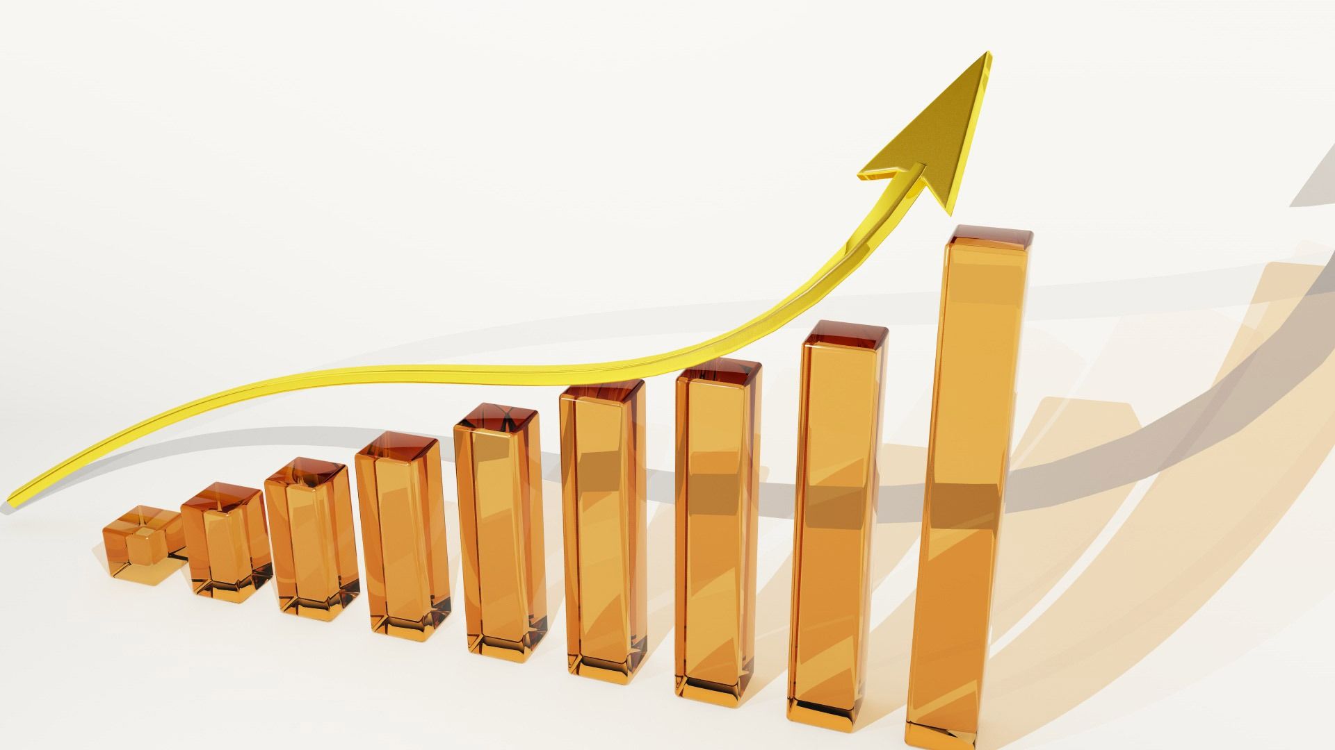 A 3D bar graph with orange bars increasing in height from left to right, topped by a yellow upward-curving arrow indicating growth or progress.