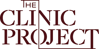The image displays the logo for "The Clinic Project" in bold, dark red capital letters with a stylized line connecting the words, reflecting a modern vibe suited to an allied health business coach in Sydney.