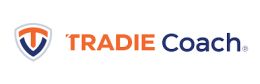 Tradie Coach logo with an orange and navy blue shield icon on the left, and “TRADIE Coach” in orange and blue text on the right—ideal for a plumbing business coach Perth professionals can trust.